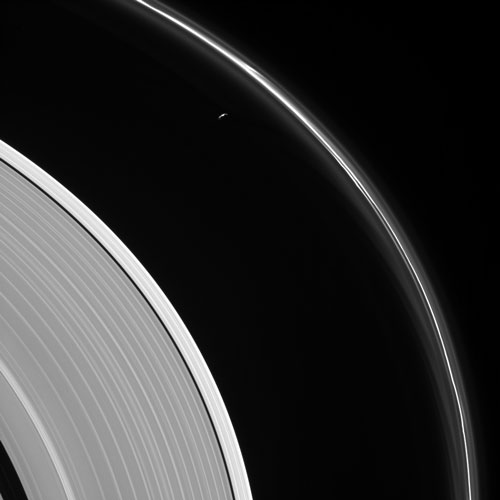 Saturn_s_rings_and_Prometheus.jpg